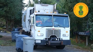 Peterbilt 320 Wayne Curbtender Garbage Truck Grabbing a Few Carts (Clip)