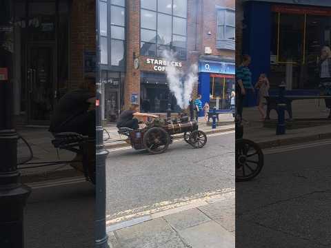 Steam Train Driving Up the Highstreet