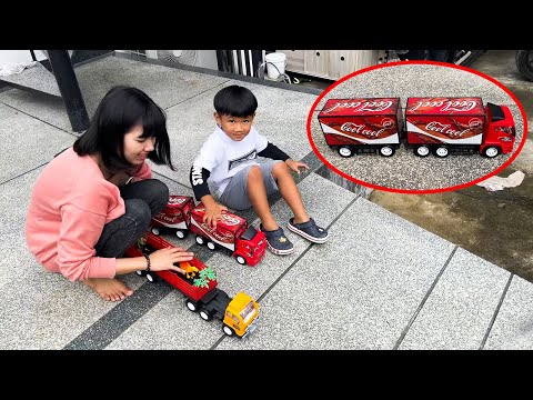 น้องภูมิ | เล่นรถบรรทุกโค้ก สไลเดอร์