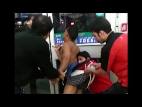 Chinese shop lifter forced to strip