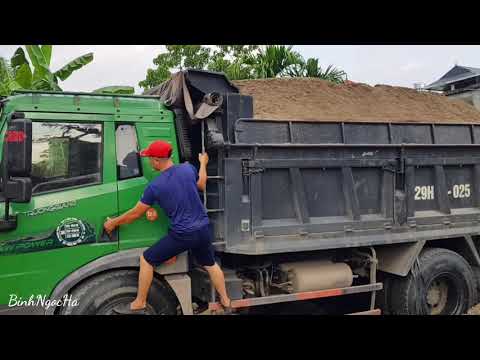 Truck dumping sand