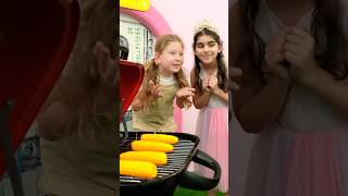 Oliver grills Corn