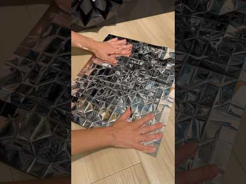 Folding reflective sheet into geometric forms. Origami; Prop 4(Reflective sheet)