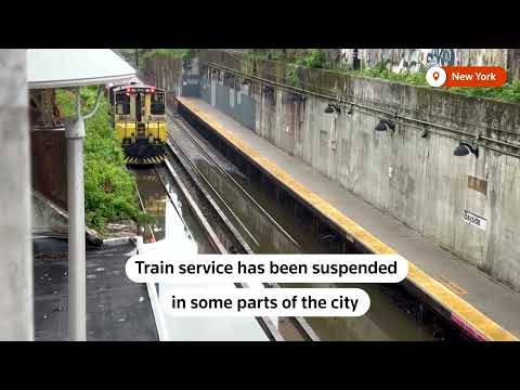 YouTube video thumbnail: NYC Flooding Pours Into Subway as State Declares Emergency