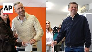 Ulrich Siegmund and Sven Schulze vote in Germany election