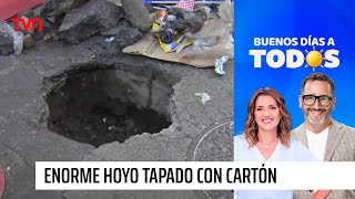 Provocó un accidente: Enorme hoyo estaba tapado con cartón en pleno centro de Santiago | BDAT