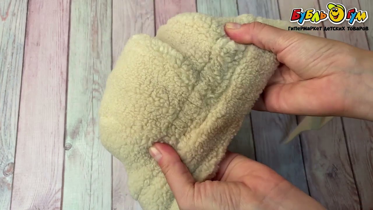 Шапка зимняя молочного цвета - видео