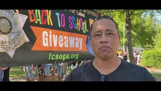 YouTube video thumbnail: Fulton County Gives Away 1,000 Backpacks to Help Students Start the School Year