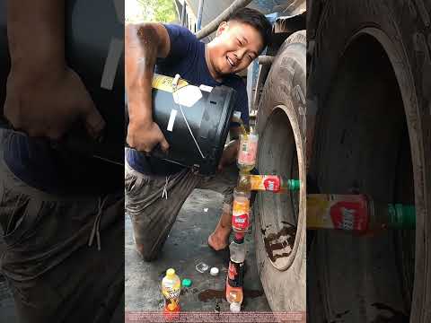 Smart Mechanic Uses a DIY Plastic Bottle Tool to Lubricate Truck Axle