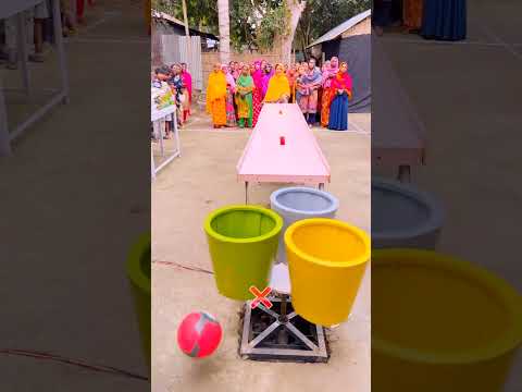 If you drop the ball into one of the three rotating buckets, you will get a prize