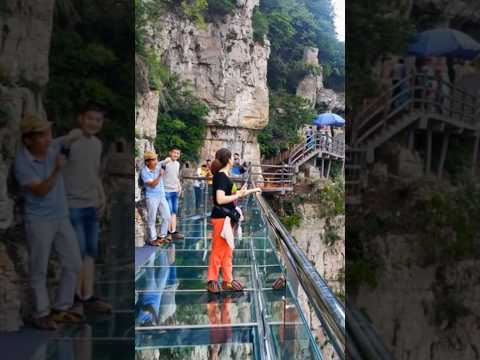 Massive Rock Falls Next to Tourists on Glass Bridge!