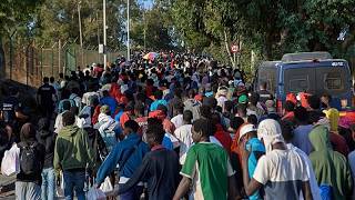 YouTube video thumbnail: Spanish Authorities Begin Relocating Migrants From Ceuta Beach to Temporary Shelters