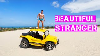 Beautiful Stranger On The Beach
