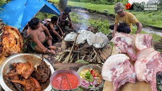 Pork Ribs with Fats Cooking over Fire in Aluminum Foil Jungle Cooking Crispy Deep Roast Pork Ribs