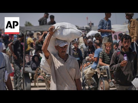 YouTube video thumbnail: Aid Workers in Gaza City Distribute Flour for the First Time in Months