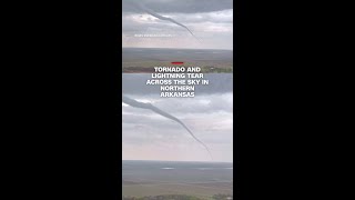 Tornado and lightning tear across the sky in northern Arkansas