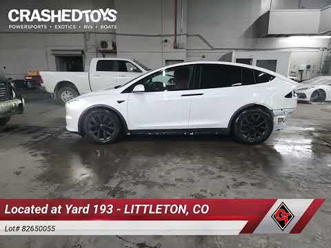 ✅ 2022 Tesla Model X • VIN: 7SAXCBE50NF336328 • Lot: 82650055. Listed on Copart with 49,594 mi. Free auction sales archive from the USA and detailed vehicle history report at DreamBid. Image 18.
