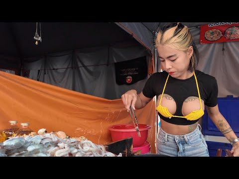 Hardworking Thai Lady Cooking Delicious Fried Mussels and Seafood -Thai Street Food