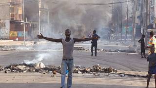 YouTube video thumbnail:  Ivory Coast: 12 Charged Over Gendarme’s Killing Amid Lingering Election Tensions 