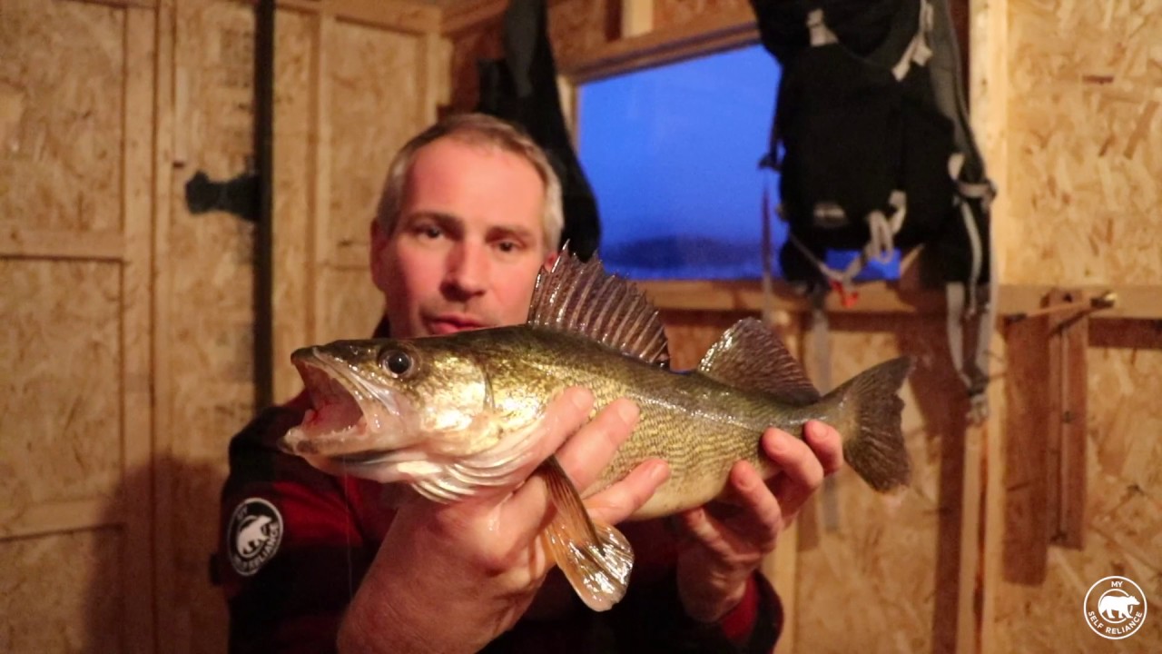Couple's Ice Fishing in Northeastern Ontario