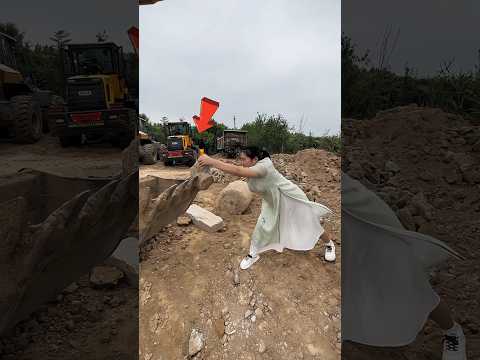 Girl JCB driver removed the stone easily ?