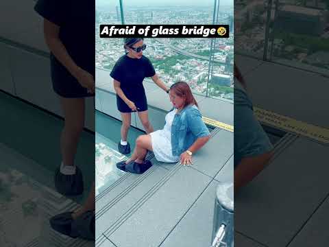 Afraid of glass bridge🤣#afraid #glass #glassbridge #youtube #foryou  #funny