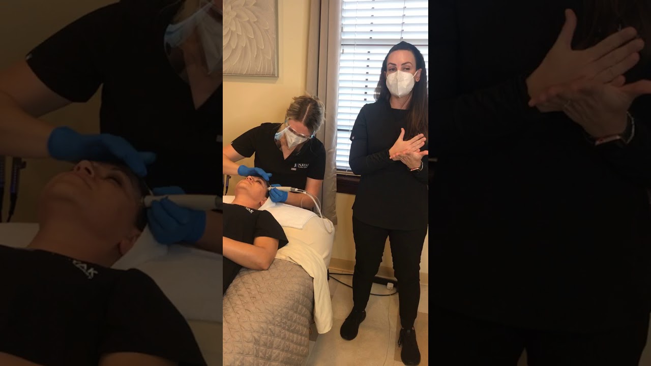 Aesthetic treatment session in a clinical setting.