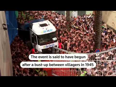 YouTube video thumbnail: Revelers Hurl Tomatoes During Spanish Food Fight Festival