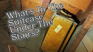 What in the Suitcase Under the Stairs?