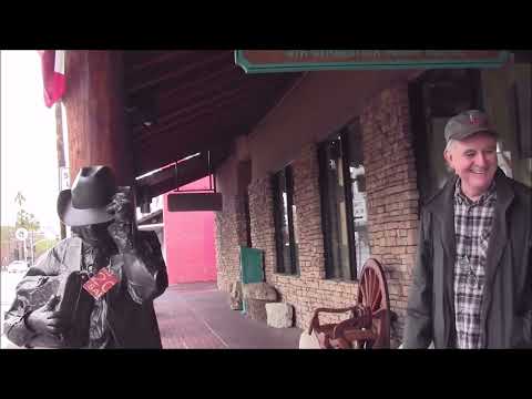 Bronze Cowboy LOVES his job!  Not a job...  spreading laughter!