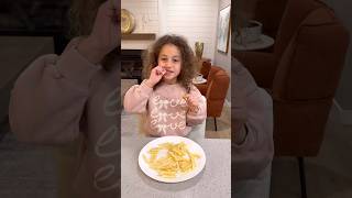 Sierra teaches Rhia to eat properly - kids learning how to eat