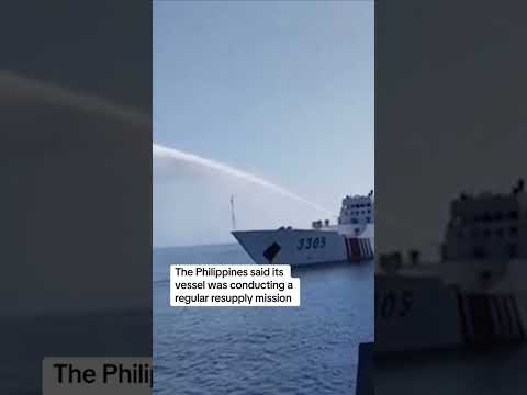 China blasts water cannon on ships