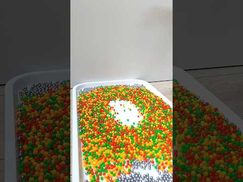 Tower of Plastic and Steel Beads Oddly Satisfying (Reverse)