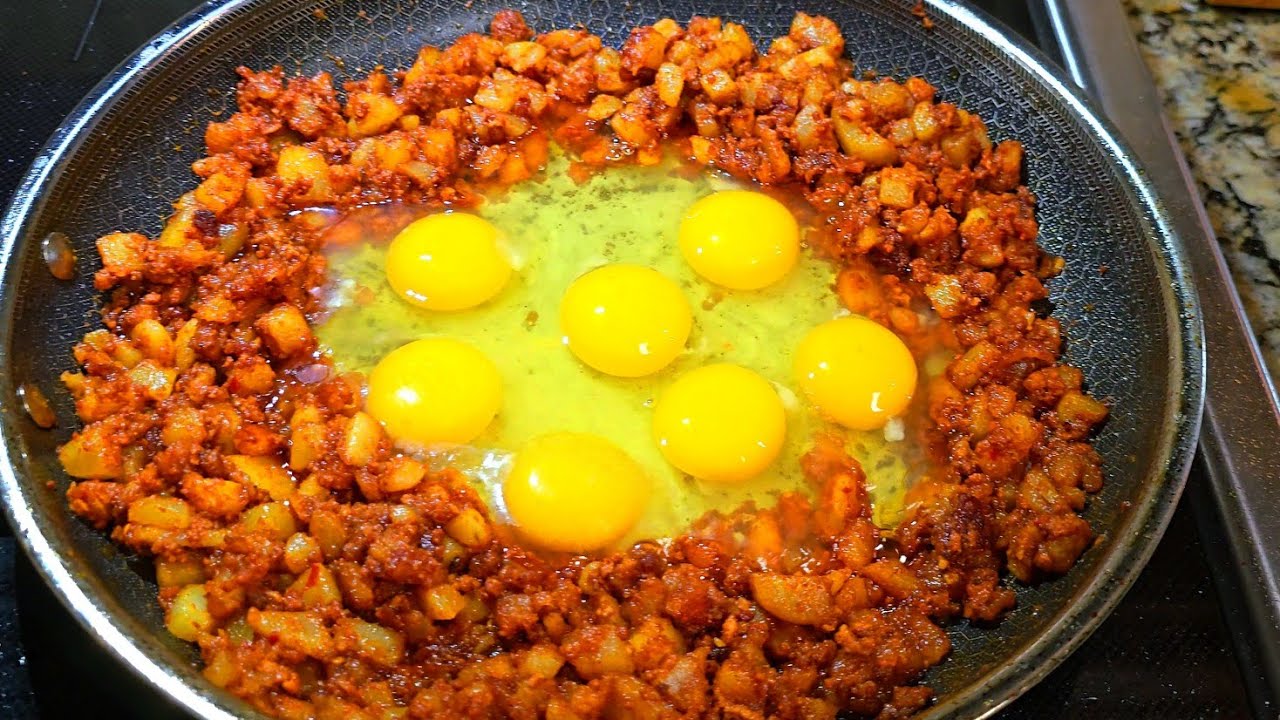 Add eggs to potatoes & chorizo for the perfect breakfast taco - Papas con chorizo recipe