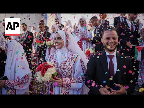 YouTube video thumbnail: 54 Couples get Married in a Mass Wedding in war-Ravaged Gaza