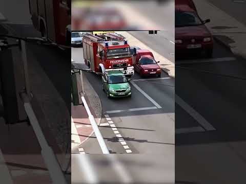 Ignorant Driver Blocks Fire Truck.
