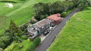 Charm and Nature Retreat in Cedros: Unique Property with Traditional Stone House, Gardens, and River