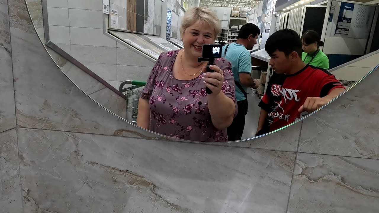 Выбрали красивые обои в спальню. Купили плитку в ванную комнату.