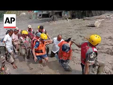 Rescue operations in Nepal after avalanche triggers deadly flash floods