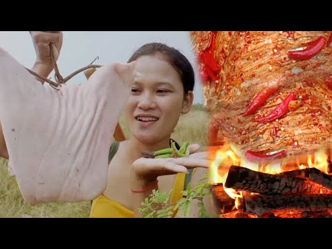 Survival in jungle Cooking pork in the rainforest