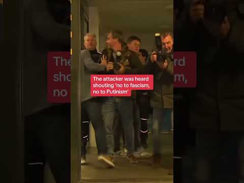 Dutch far-right leader hit with umbrella