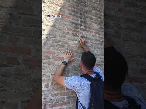 Italy searching for man who was filmed carving names into Rome's Colosseum | NBC4 Washington