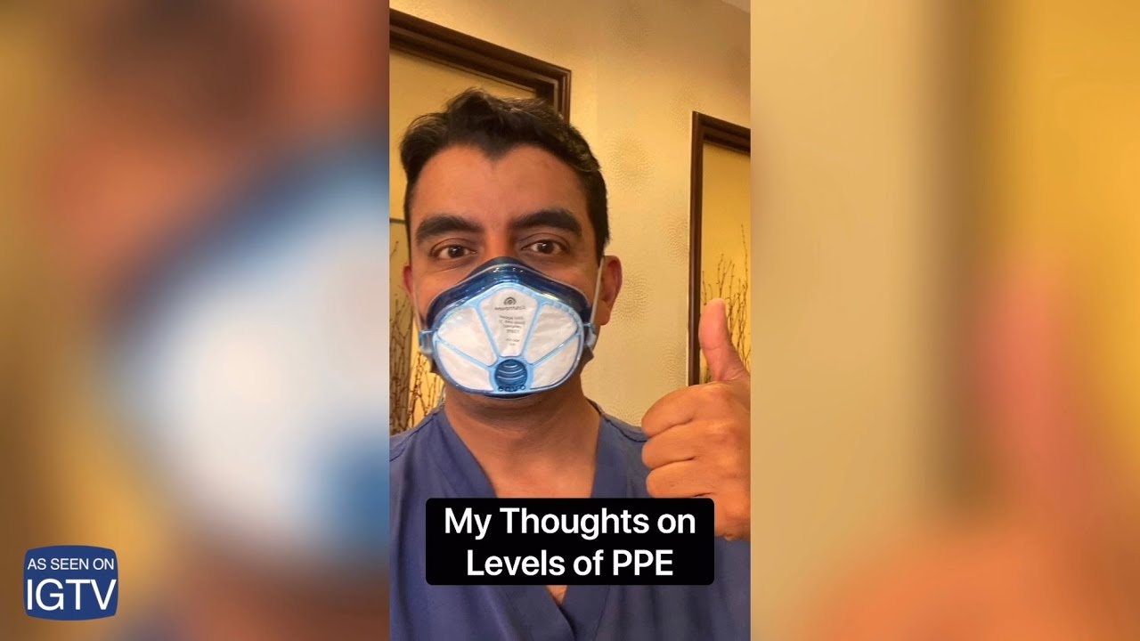 Man in PPE discussing personal protective equipment.