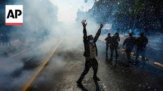 YouTube video thumbnail: Protesters Clash With Police in Chile Over Planned Education Budget Cuts