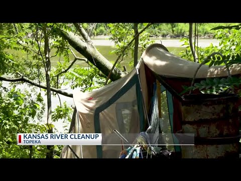 YouTube video thumbnail: City Workers Remove Trash From Bank of the Kansas River in Topeka