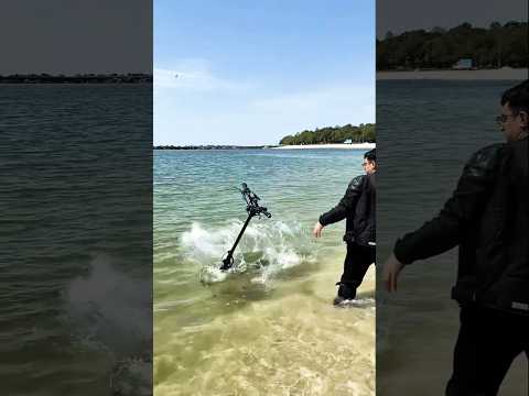 🤯Throwing a scooter in the Ocean🏝 it is waterproof?🤔 #escooter #electricscooter #popular #shorts