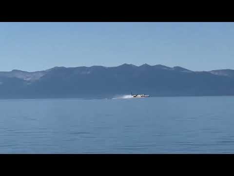 Plane fills water at Cedar Beach to fight Davis Fire in Nevada