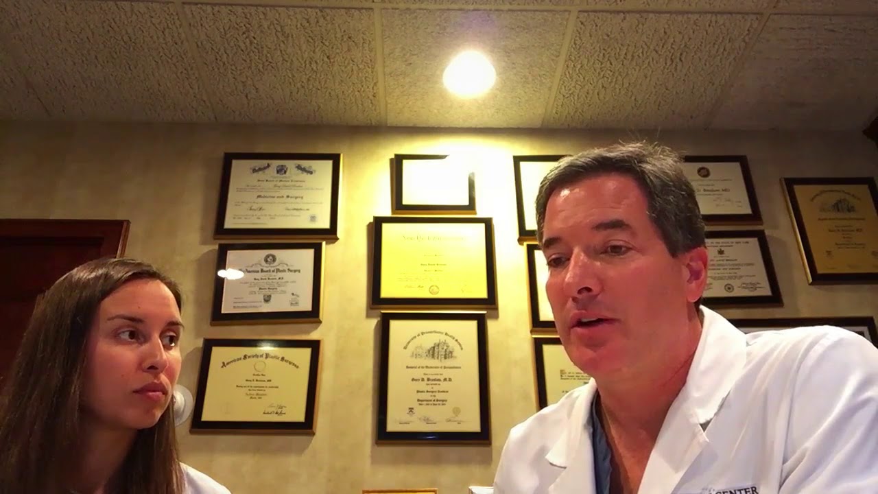 Medical professionals discussing in an office setting.