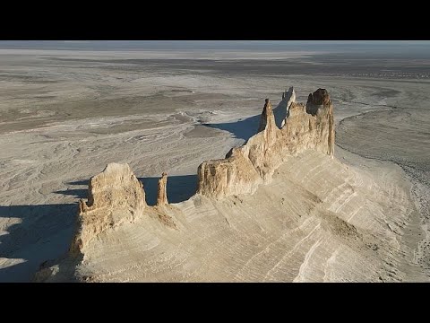 YouTube video thumbnail: Kazakh Grand Canyon and Sacred Caves – Explore the raw Beauty of Mangystau