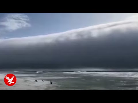 YouTube video thumbnail: Rare Weather Phenomenon Sweeps Portugal Beach During Heatwave